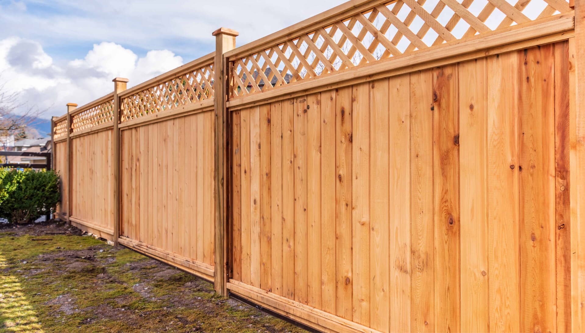 A custom wood fence installation is completed on a property in Wausau, WI.